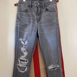 Grey skinny jeans with white distress